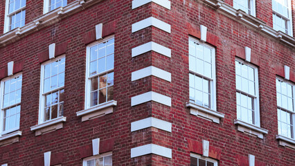 Traditional London streets lined with historic and cultural buildings.