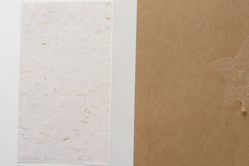 textured crafting paper blended with grass fragments on a 3d surface and brown paper with...