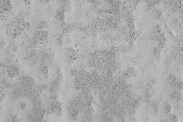 Abstract Grunge Texture: A close-up, capturing the raw texture of a weathered surface, reveals the subtle interplay of tones and intricate patterns. The abstract composition evokes a sense of age.