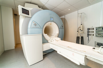 Modern scanner imaging room. A clean diagnostic imaging room features a modern scanning machine...