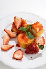 Breakfast cheese cottage pancakes beries on white plate