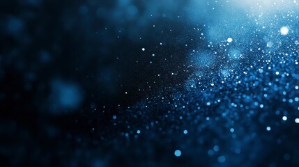 Abstract Blue Glitter Background with Dark Backdrop and Bokeh Effect