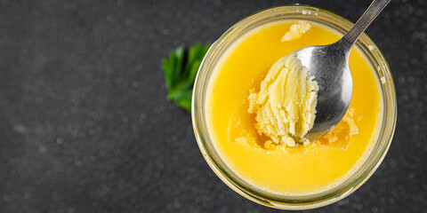 Ghee butter or clarified butter delicious gourmet food background on the table rustic food top view copy space keto and paleo diet vegetarian and vegan food