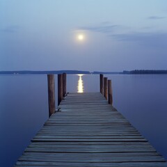 Fototapeta premium A quiet fishing dock, with the full moons glow reflecting gently on the wooden planks ar 16:9 v 6.1 q 2