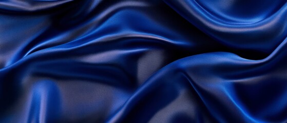 Obraz premium Deep Blue Fabric Texture with Draped Folds and Subtle Sheen