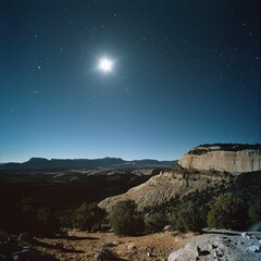 A bright moon casting long shadows over a quiet mountain landscape, stars twinkling above ar 16:9 v 6.1 q 2
