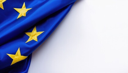 European Union flag draped elegantly with golden stars on deep blue fabric backdrop