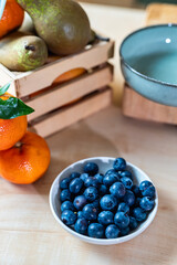 Detail of fresh fruit on a rustic countertop