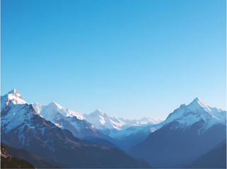 Fototapeta premium Majestic snow-capped mountains under a clear blue sky, winter landscape panorama