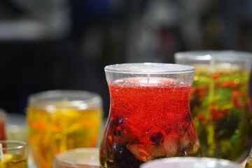 Gel candles in glass bowls. Craft fair.