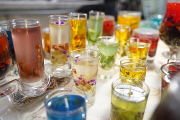 Gel candles in glass bowls. Craft fair.