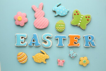  Easter biscuit moulds in pastel colours. Easter egg, bunny and chicken. Happy Easter day concept. Minimal concept. Space for text. Easter cookery on the background of baked goods.