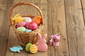  Easter biscuit moulds in pastel colours. Easter egg, bunny and chicken. Happy Easter day concept. Minimal concept. Space for text. Easter cookery on the background of baked goods.