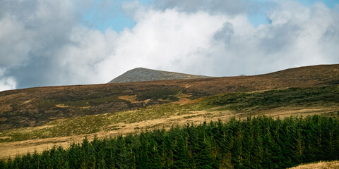 Wide open landscapes greet hikers along the Carrauntoohil walkway, with lush greenery in the...