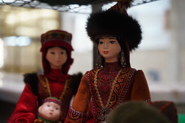 Dolls in Kazakh national costumes. Craft fair.