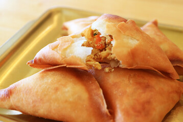 Closeup of Flavorful Samosa Filled with Spiced Chicken and Veggie