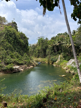 Indonesia's natural beauty with river and forest views at Sri Gethuk waterfall
