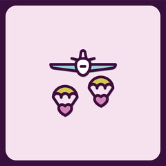 Airplane dropping two parachutes with hearts