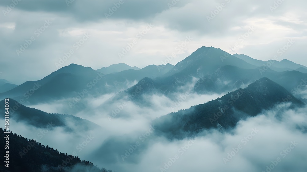 Poster majestic mountain range covered in a veil of ethereal fog and mist creating a moody and atmospheric 
