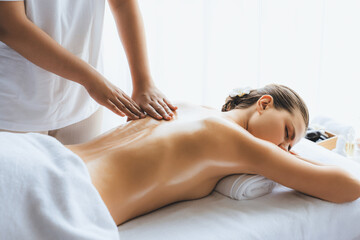 Caucasian woman customer enjoying relaxing anti-stress spa massage and pampering with beauty skin...