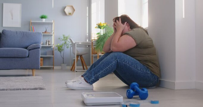 Unmotivated, unsporty sad obese woman with excessive fat trying to do sport, chubby overweight plus size big fat fit lady with no progress in weight loss after sport, dieting not changing or improving