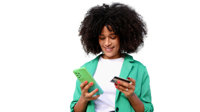 Smiling afro businesswoman making online payment using smartphone and credit card on transparent background