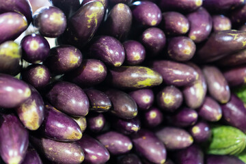eggplants on a market stall