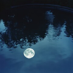 Fototapeta premium A crystal clear reflection of the moon on the surface of a still water pool ar 16:9 v 6.1 q 2