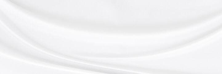 White gray satin texture that is white silver fabric silk panorama background with beautiful soft...