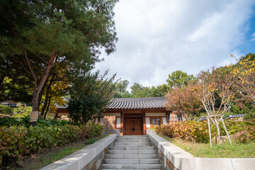Building in Bongeunsa Temple, a Buddhist temple in Seoul. With background of autumn leaves.