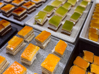 Dessert Buffet with cakes, pastries and sweets in self service restaurant close up