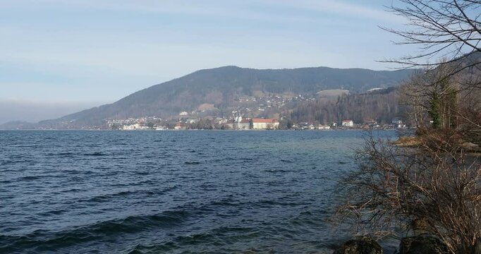 Old castle and the local Brewery of Tegernsee on the eastern shore of lake seen from the beach 'Hundestrand' of Rottach-Egern