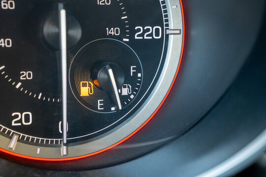 Empty fuel light on black background