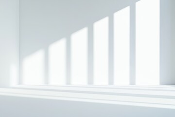 Obraz premium Bright minimalist room with strong light and shadow patterns on the floor and white walls