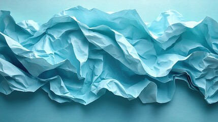 Obraz premium Crumpled mint paper sheets with line partition, a trendy abstract background.