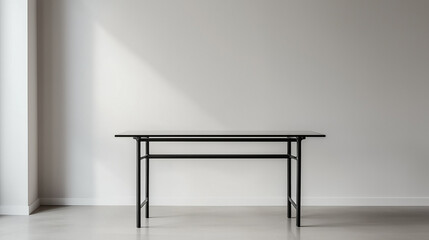 A clear glass table positioned against a blank wall, offering sleek minimalism and refined transparency