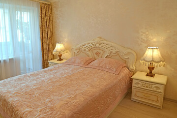 Bedroom with two table lamps. Modern classics