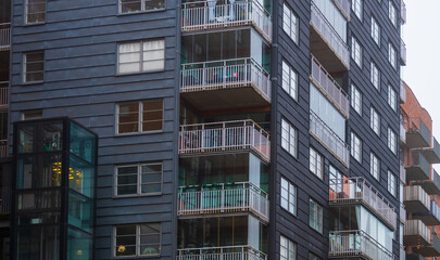 Obraz premium modern residential building with glass balconies.