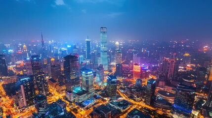 Fototapeta premium Shanghai Skyline at Night: A Panoramic View of Modern China's Vibrant Metropolis
