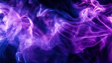 Fototapeta premium Colorful swirling smoke plumes against a dark background are depicted