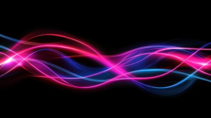 Fototapeta premium Colorful flowing light streaks over a dark black background