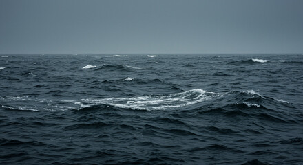 Fototapeta premium Dark stormy ocean waves under moody sky