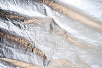  A Crumpled Metallic Foil with Reflective Silver Highlights