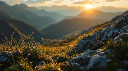 A breathtaking sunset over a mountain range, with the sun casting a golden hue over the grassy terrain. The foreground is dominated by the rocky outcrop, while the middle ground reveals a lush meadow 