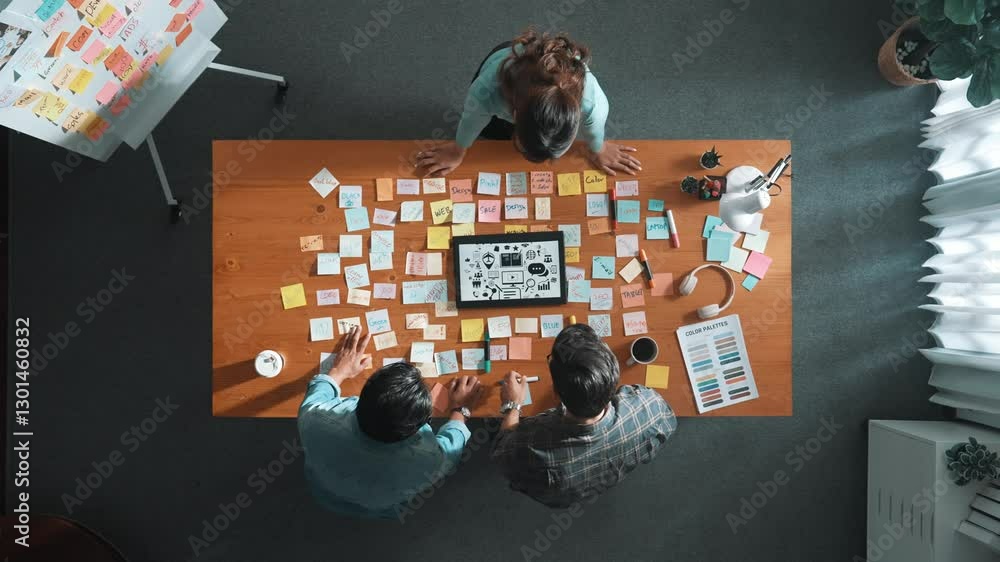 Poster top view of creative designer working together brainstorming idea by using sticky notes at meeting t