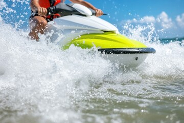 Naklejka premium Person riding a jet ski creating waves, splashing through ocean water on sunny day.
