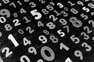 Abstract Mathematical Numbers on a black and white Background. Finance and Data Concept. Futuristic Digital Design. Cyber Tech Theme