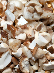 Close up of raw sliced and chopped mixed mushrooms fungi