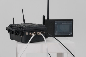 Advanced Electronic Warfare Equipment Displayed on a Minimalist Stand