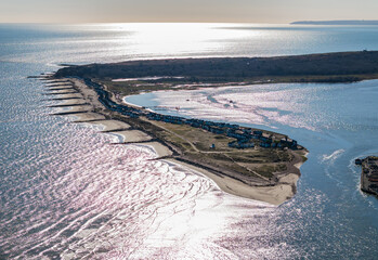 Naklejka premium Aerial shot of Mudeford Sandbank and Christchurch Harbour on a sunny day